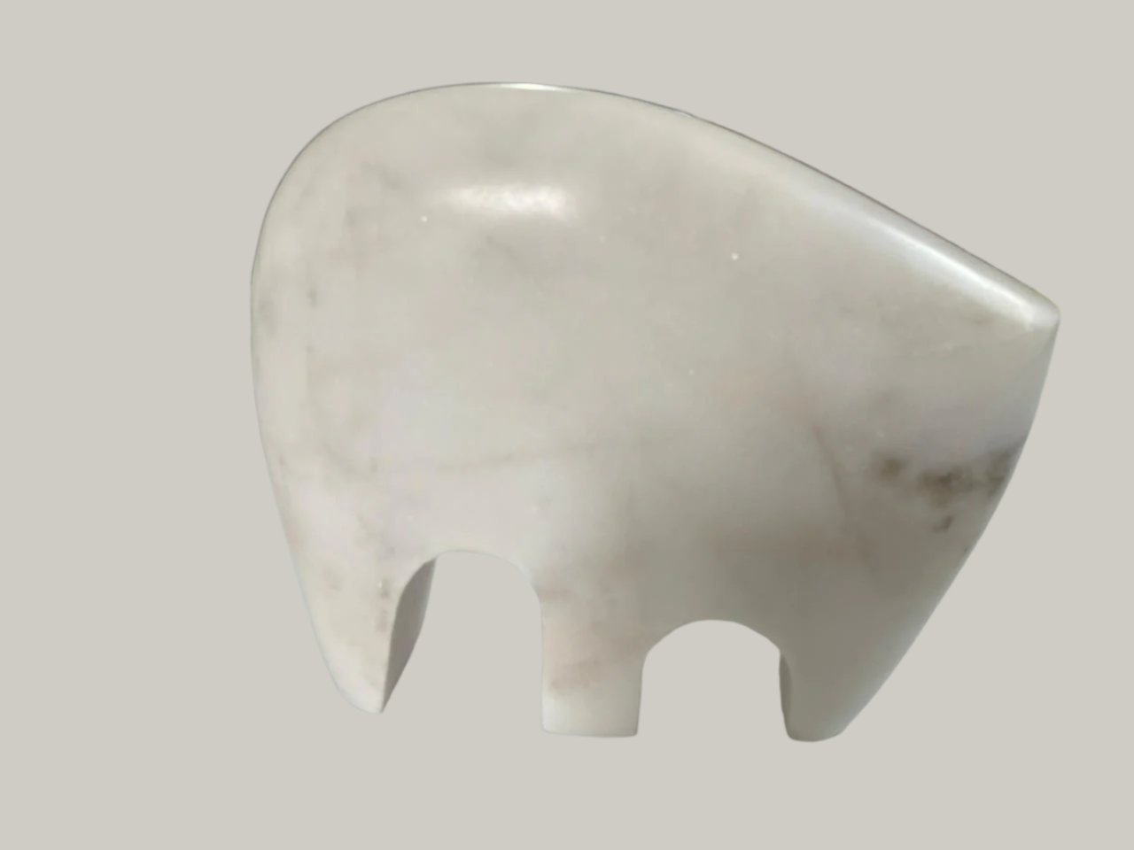 "Trio of Marble Elegance: Elephant, Bear, and Rhino Sculptures"